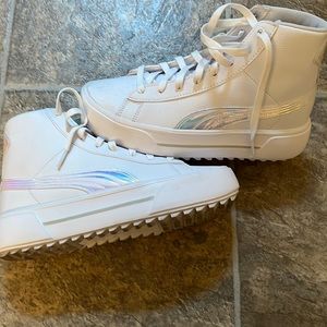 Puma platform sneaker. Pristine, white, and iridescent accents.